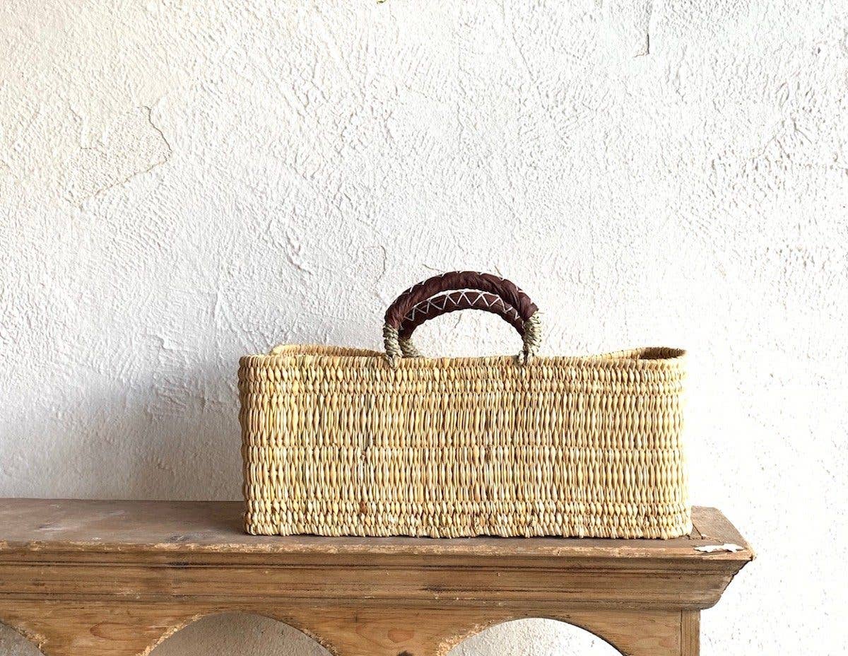 REED BASKET WITH LEATHER HANDLES