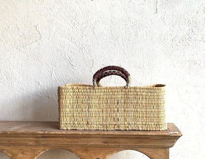 REED BASKET WITH LEATHER HANDLES