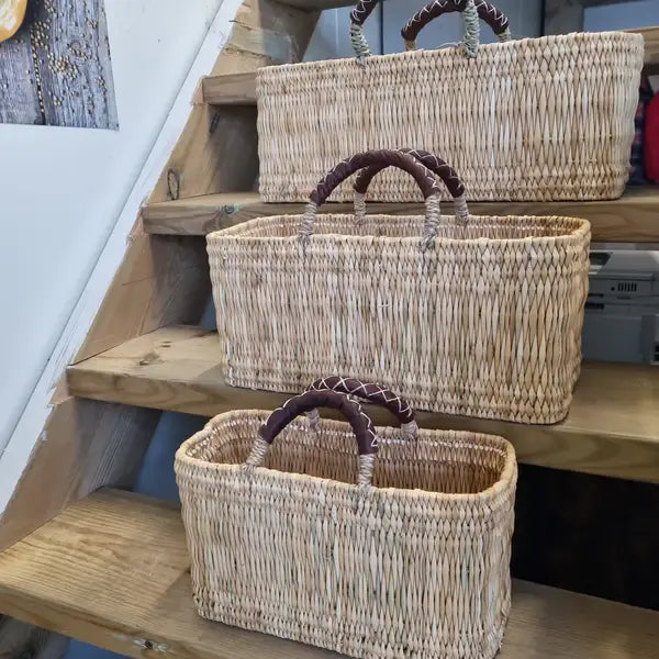 REED BASKET WITH LEATHER HANDLES