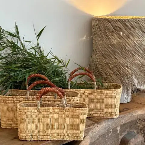 REED BASKET WITH LEATHER HANDLES