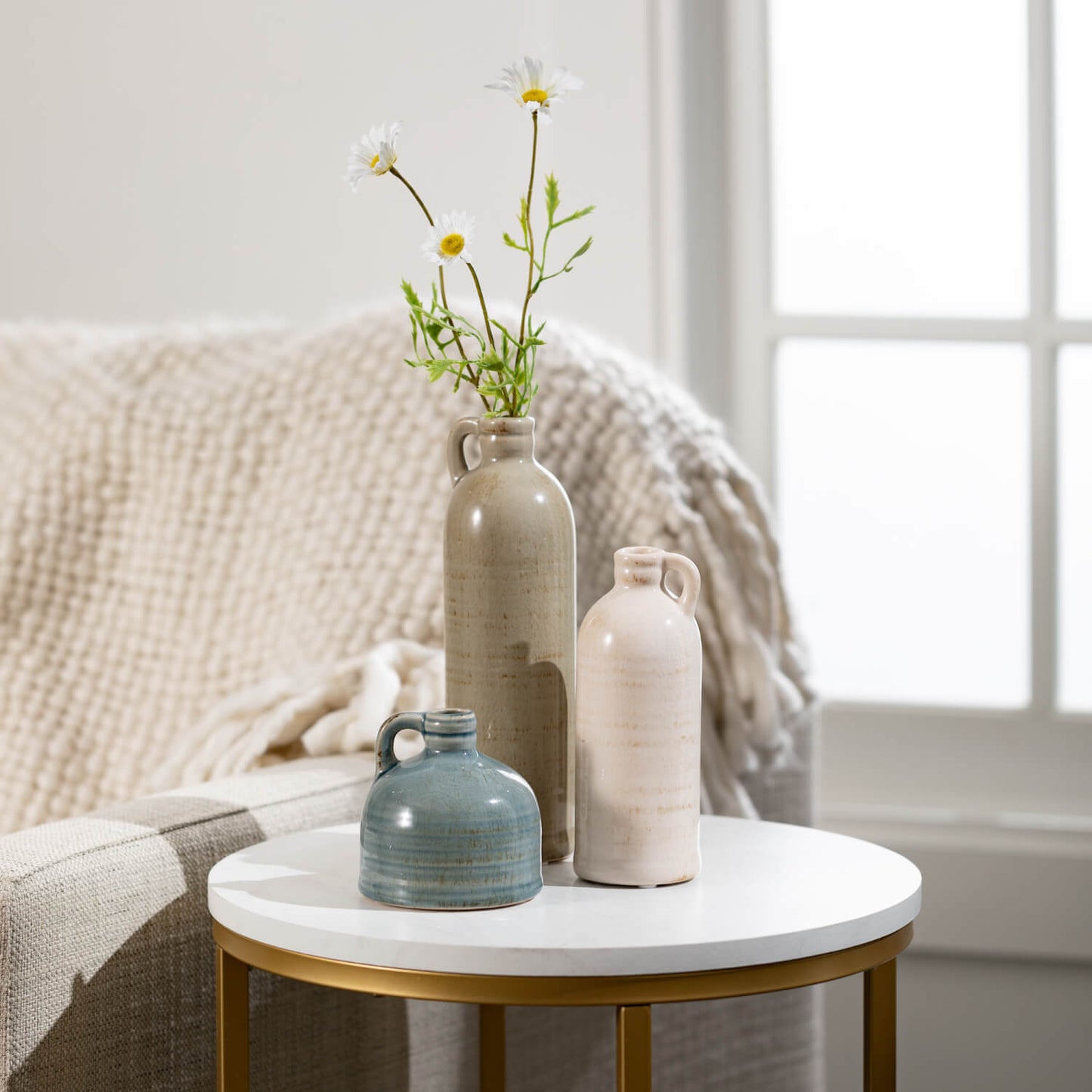 Set of three jug vases. Made of quality Ceramics. Waterproof. The neutral color scheme fits in almost anywhere and although they look great on their own as shelf fillers, try dropping a single stem into each one and making them the center of attention. So Cute. - change out the flowers to fit the…